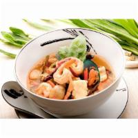 Seafood Noodle Soup · Spicy and sour lemongrass broth with shrimp, mussel, squid, fish fillet,mushrooms and noodle.