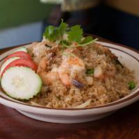 Thai Fried Rice · Rice with a choice of meats, tomato, onion, egg, pea and carrot.