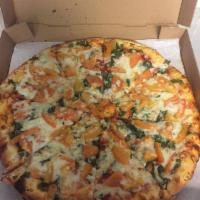 Margherita Pizza · Fresh basil, garlic, tomato and fine mozzarella cheese.