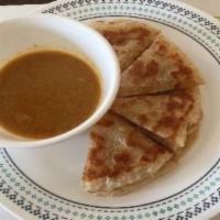 1. Paratha · 2 piece. Coconut diced chicken sauce or chana dal with potato sauce. Multi-layer bread serve...