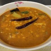 22. Chana Dal Mixed Vegetable Soup · Chana dal split bean, eggplant, okra, cauliflower, opo squash, potato cooked with house spec...
