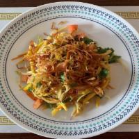 13. Mango Salad · Shredded pickled mangos mixed with cabbage, tomato, red onion, cucumber, carrot and fried on...