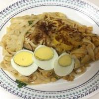 25. Nan Pya Dok · Flat wheat flour noodle mixed with coconut diced chicken sauce, bean powder, red onion, cila...