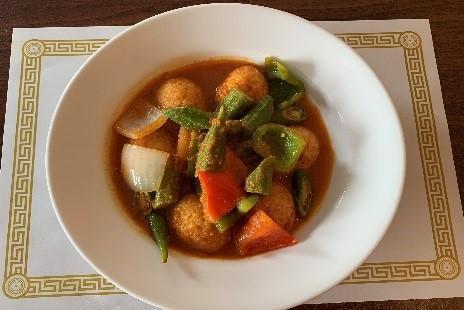 32. Okra Egg Curry · Okra and fried hard boiled egg cooked with green and red bell peppers, yellow onions and house special tomato paste.