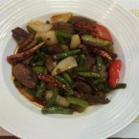 46. Saucy Spicy · Stir fry with string beans, green and red peppers, yellow onion, dried chili, Sriracha hot c...