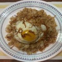 50. Yellow Bean Fried Rice · Jasmine rice fried with yellow pea, red onions and fried egg.