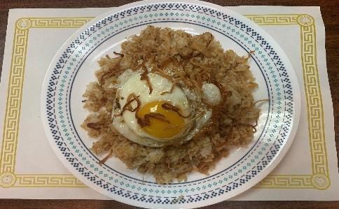 50. Yellow Bean Fried Rice · Jasmine rice fried with yellow pea, red onions and fried egg.