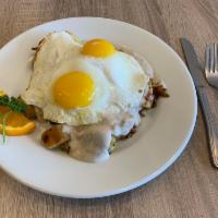 Country Skillet · Home-fried potatoes, 2 eggs any style, served with sausage gravy and toast
