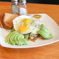 Veggie Skillet · Home fried potatoes, grilled peppers, onions, spinach, avocado, topped with 2 eggs any style...