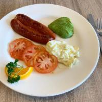 Fitness Trainer Plate · Chicken apple sausage, 3 egg whites, tomatoes and sliced avocado.