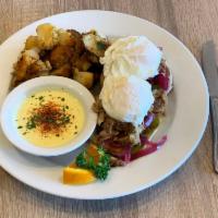 Pulled Pork Benedict · Tender, slow-cooked pulled pork topped and jalapenos.
