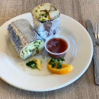 Herbivore Wrap · Zucchini, scrambled eggs, potatoes, onions, bell peppers, sour cream and Parmesan cheese. Ma...