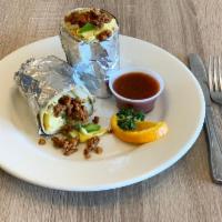 Spicy Lover Wrap · Chorizo, jalapenos, scrambled eggs, potatoes, onions, bell peppers, sour cream and melted ch...