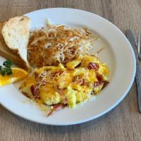 Classic Scramble · Eggs, cheddar, and choice of bacon, sausage, ham, or chicken.