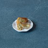 Viet­namese Crispy Egg Roll · Crispy egg rolls filled with fresh cabbage, carrots, onions and vermicelli noodles. Choice o...
