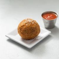 Arancini · Arborio rice mixed lightly with tomato sauce and romano cheese, rolled and stuffed with font...