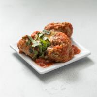Homemade Meatballs · 3 of meatballs made in-house, topped with marinara sauce and grated parmigiana.