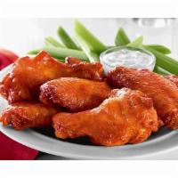 Traditional Crispy Wings · Choose between 6 or 12 of our crispy breaded wings. Served with ranch and side of carrots & ...