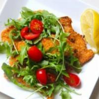Chicken Milanese · Pounded Breaded Chicken Breast lightly fried, Balsamic Marinated Cherry Tomatoes, Arugula, L...