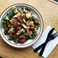Fattoush Salad · Romaine, tomato, cucumber, onions, peppers, and radish tossed in lemon, oil and spices toppe...