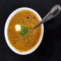 Dal Makhani Vegetarian · Black lentils, tomatoes, reduced cream, ginger, garlic and spices. Served with steamed aged ...