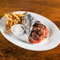 Pork Souvlaki Sandwich · Chunks of seasoned grilled Pork chunks wrapped in a pita with lettuce, tomatoes, and onions....