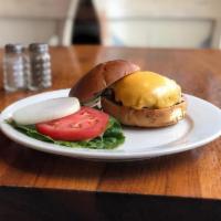 Grass-Fed Classic Burger  · With american cheese, prime chuck sirloin, onions, lettuce and tomato on a brioche bun