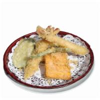 K12. Shrimp and Vegetable Tempura · Six pieces of shrimp and vegetables. Served with soup, salad and rice.