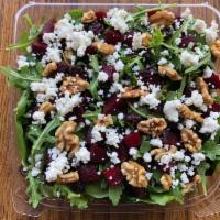 Side Beet Salad · Spring Mix, Arugula, Beets, Walnuts, Dried Cranberries, Goat Cheese.