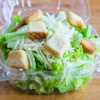 Side Caesar Salad · Romaine lettuce, shredded Parmesan cheese, croutons and Caesar dressing.