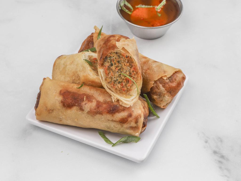 Thai Spring Rolls · These rolls are crispy, crunchy and very satisfying. They are filled with chicken, cellophane noodles and veggies served with tangy sweet and sour chili sauce.