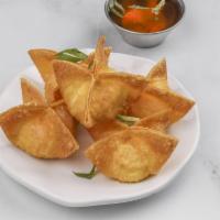 Thai Crab Rangoon · Fried wonton filled with crabmeat, pineapple and cream cheese.