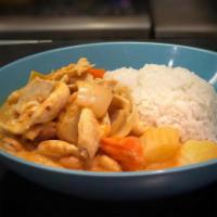 Massaman Curry · Rice with potatoes, carrots, onions and peanuts. Spicy.