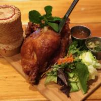 Angry Bird · A half Chicken marinated with lemongrass sauce, grilled and fried till crispy served with st...