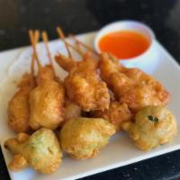 Fried Shrimp · Shrimps, battered, deep-fried and served with sweet and sour sauce.
