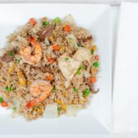 Fried Rice · Stir-fried jasmine steamed rice with egg, onions, peas and carrots with your choice of prote...