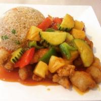 Sweet and Sour Chicken · Deep fried chicken in sweet and sour sauce with pineapple, cucumber, onions and bell peppers...