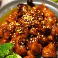 General Tso's Chicken · Lightly batter chicken deep fried and tossed in spicy tso's sauce. Served with special brown...