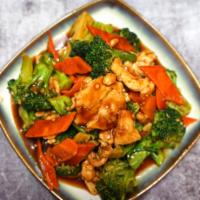 Chicken Broccoli · Sliced chicken stir fried with fresh broccoli and carrot in brown sauce. Served with special...