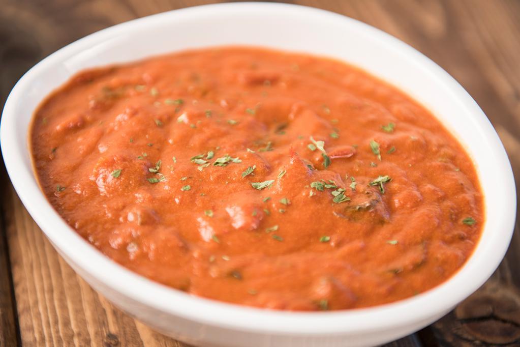 Tomato Bisque Soup · Start your meal with a bowl of our creamy Tomato Bisque. Thick and creamy soup. 