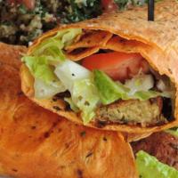 Big Fat Greek Wrap · Grilled gyro meat with crisp romaine, shredded carrots, olives, chopped tomato, onion, cucum...