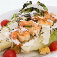 2. Grilled Romaine Hearts Salad · Grilled Romaine lettuce anchovies, Parmesan cheese, croutons and homemade Caesar dressing.