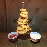 Onion Rings · Deep fried and lightly breaded onion rings served with ketchup.