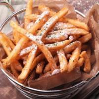 French Fries · Deep fried fries topped with parmesan cheese and parsley served with ketchup.