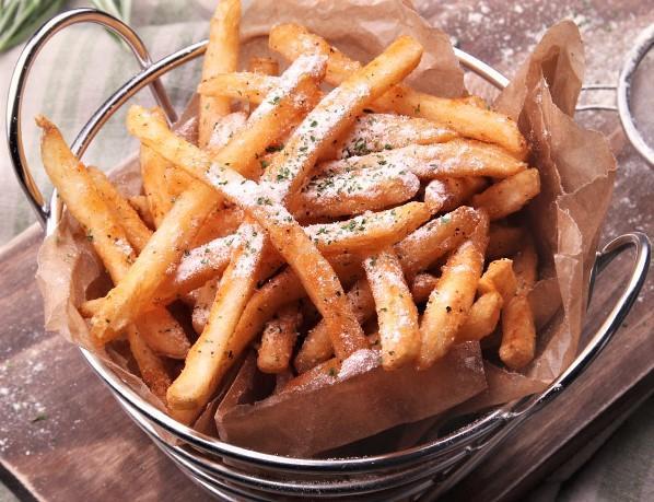 French Fries · Deep fried fries topped with parmesan cheese and parsley served with ketchup.