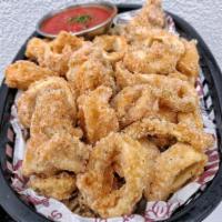 Fried Calamari · Deep fried and lightly breaded squid rings served with marinara and tartar sauce.