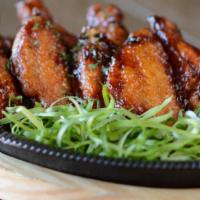 Grilled Wings · Lightly fried for crunchy skin, then grilled and marinated with our signature sauce. (Sauce ...