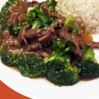 Lunch Beef Broccoli · Stir-fried beef, broccoli, carrot, shiitake mushroom, garlic, and house sauce on top of stea...
