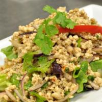 Larb Chicken Salad · Ground chicken with onions and lettuce in a spicy lime dressing. 