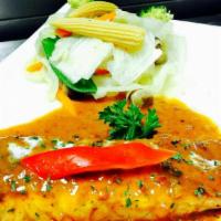 Sortrel Salmon · Grilled Atlantic salmon served with steamed mixed vegetables then topped with choice of teri...